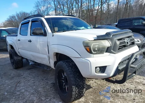 2015 Toyota Tacoma Base V6 z USA, uszkodzony, nr VIN 3TMLU4EN5FM172706